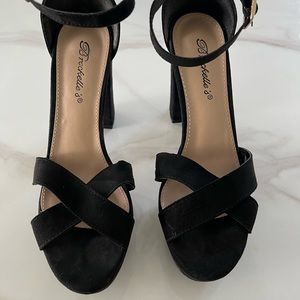 Black high 4 inch heels with ankle straps